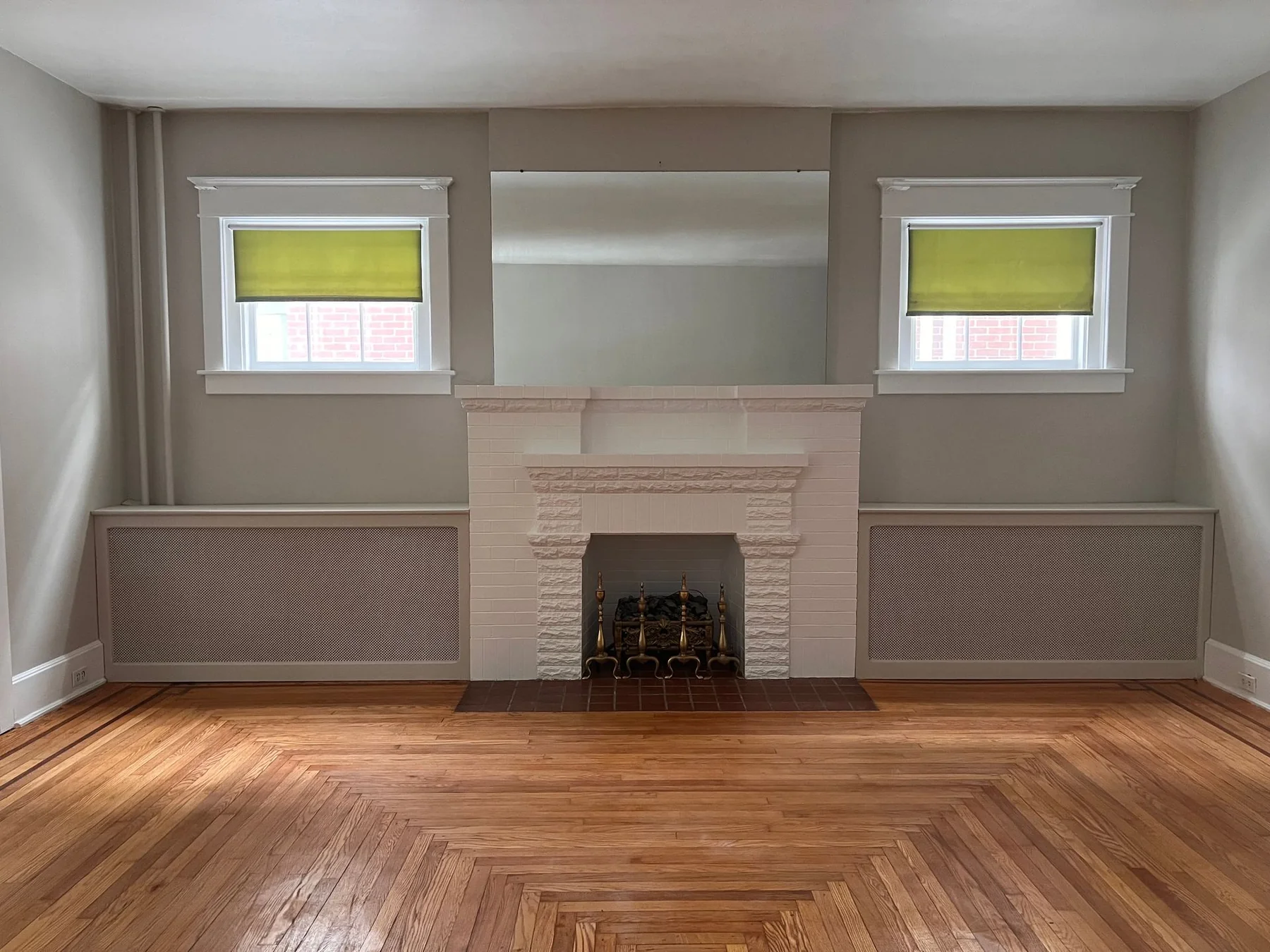 Finished living room and fireplace painting project by Premier Painting Solutions